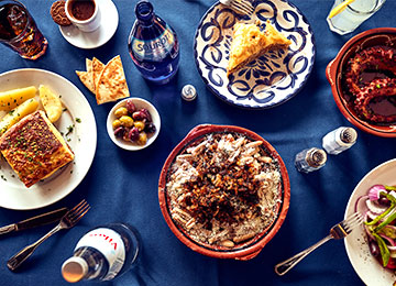 stamna table with greek dishes